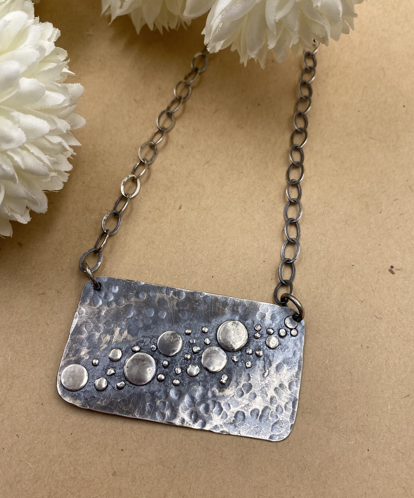 Textured Sterling silver rectangle with a diagonal swath of dots running from lower left to upper right.